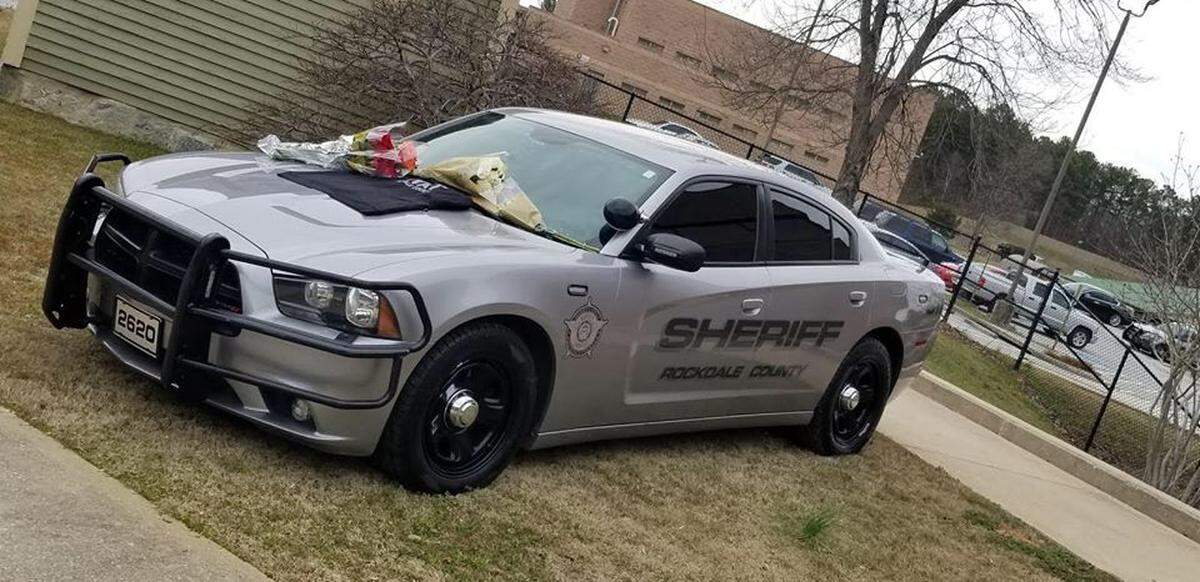 John Cole Haynie, a Georgia deputy, died Saturday from flu complications after being sick for a month, according to officials and local media outlets.