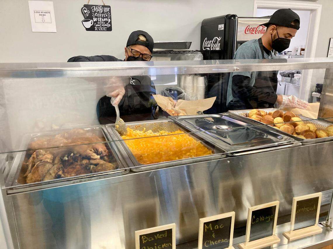 April Brinson and Rafael Brinson, mother and son, serve up some lunch at the family’s Krave Eatery & Dessert Shop at 524 North Houston Lake Blvd. in Centerville.
