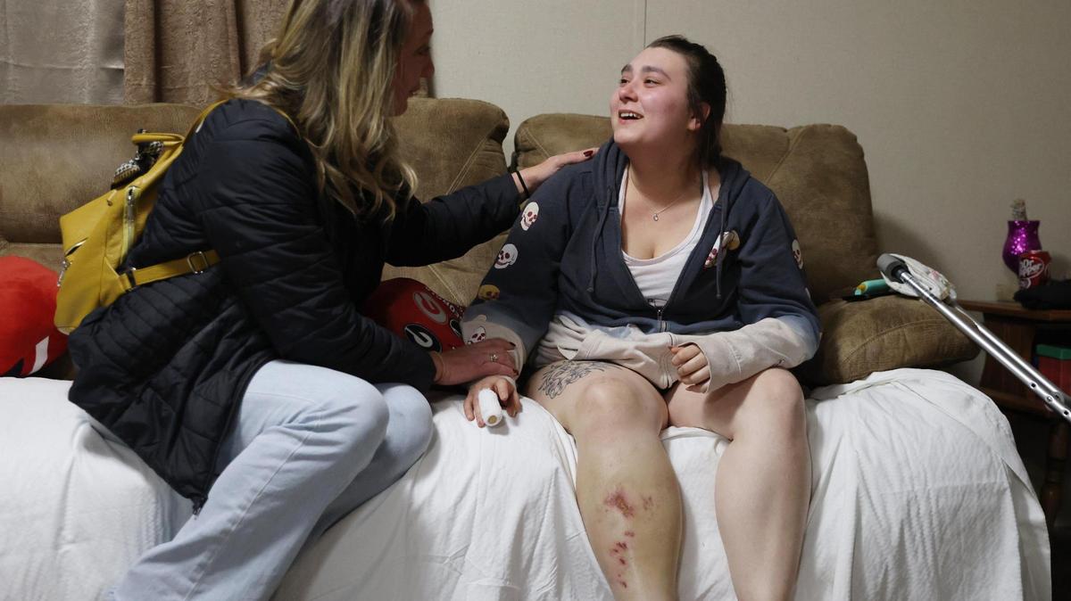 Chrissy Lynn Brown (left) reunites with Ashley Otto, 26, for the first time since the accident that killed Ashley Otto’s sister Victoria “Tori” Otto on Wednesday, Feb. 25, 2025, in Milner, Georgia. Brown pulled over on I-75 in the early morning of Feb. 16 to help them before law enforcement arrived.