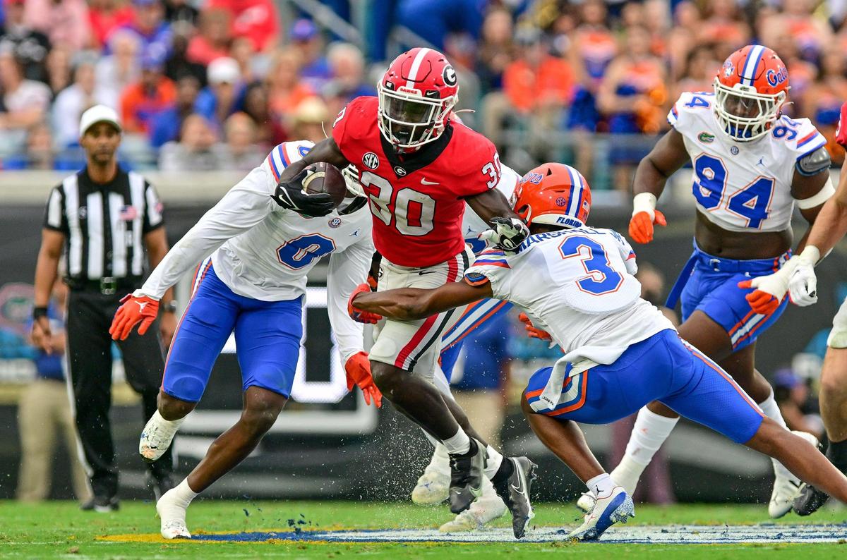 Georgia running back Daijun Edwards finds a gap in the Floida defensive line Saturday as the Dawgs beat Florida 42-20.