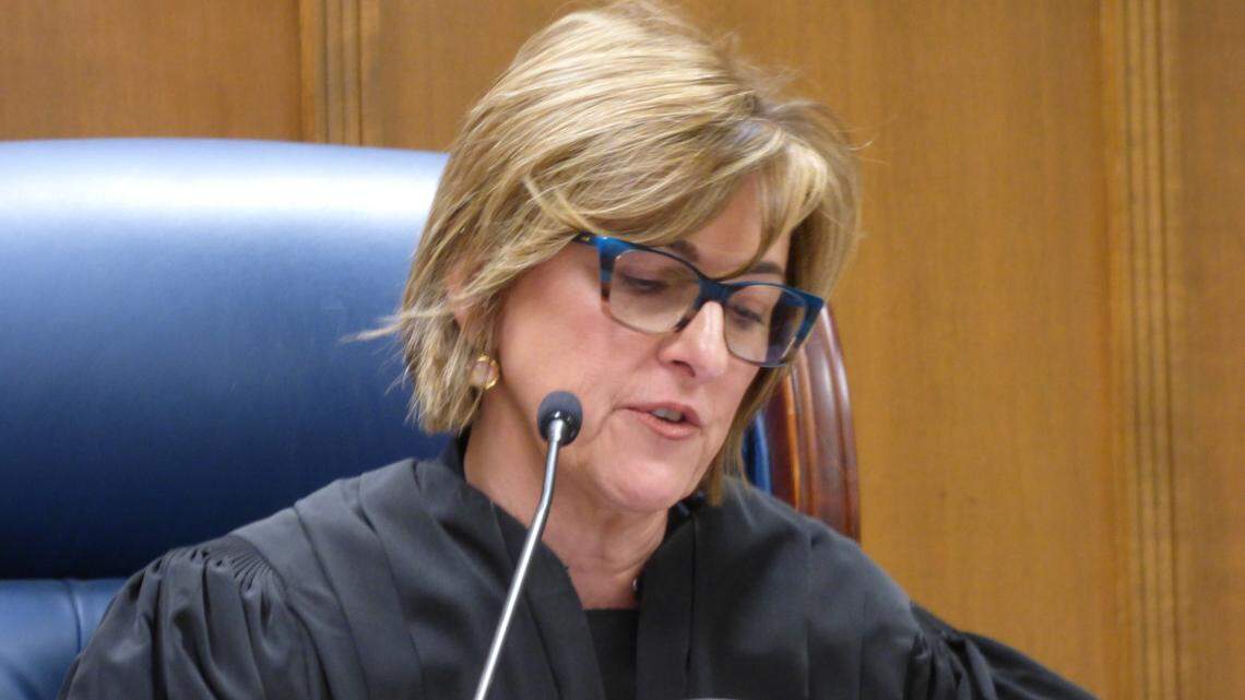 Macon Judicial Circuit Judge Connie Williford reading a letter dedicated to John “J3” Fleming’s family and friends before sentencing Raymond Leverett, who was convicted of killing Fleming, to life in prison on Jan. 23, 2026, in Bibb County Superior Court.