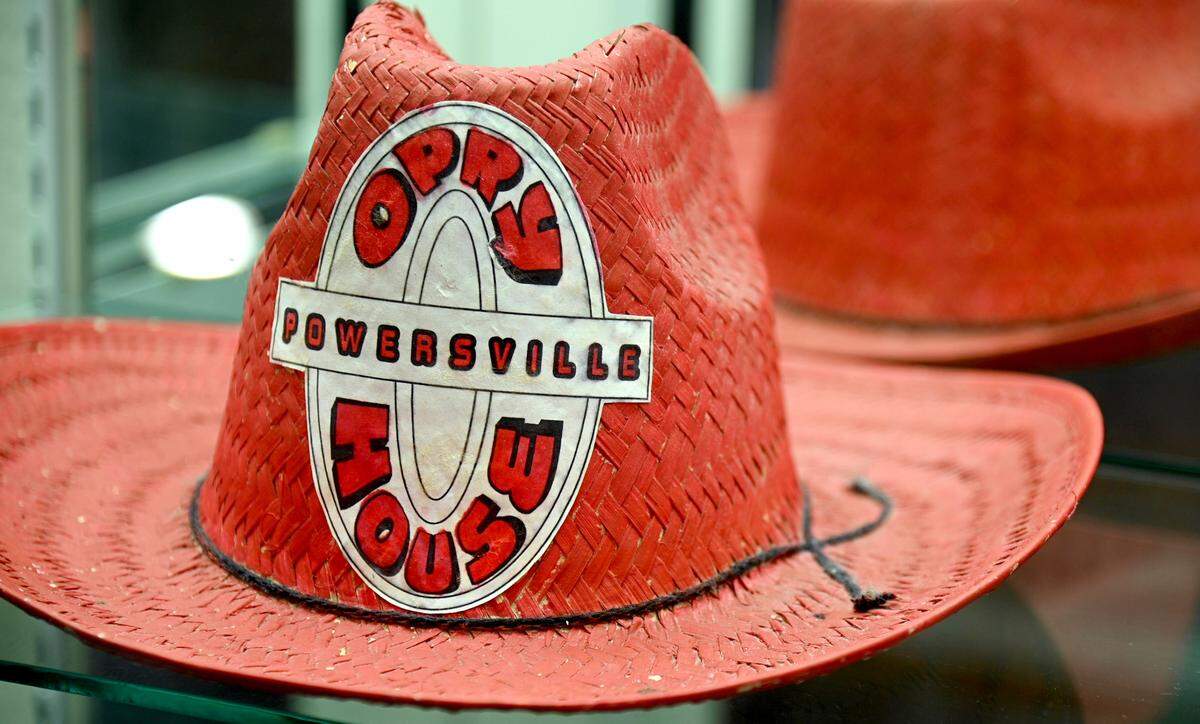 A Powersville Opry cowboy hat sits in a display case at the Opry’s new location in Hawkinsville March 31. The Opry is moving to Hawkinsville after 27 years at its former location outside of Byron.
