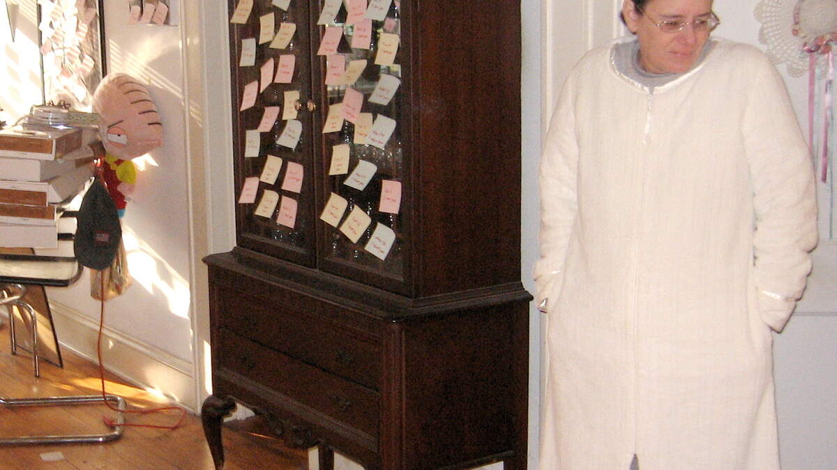 Mrs. Cool Kid awakes to discover the sticky notes gift that The Cool Kid spent a year creating.