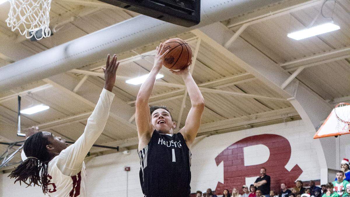 Houston County's Dayton Hall puts up a shot Friday against Warner Robins.