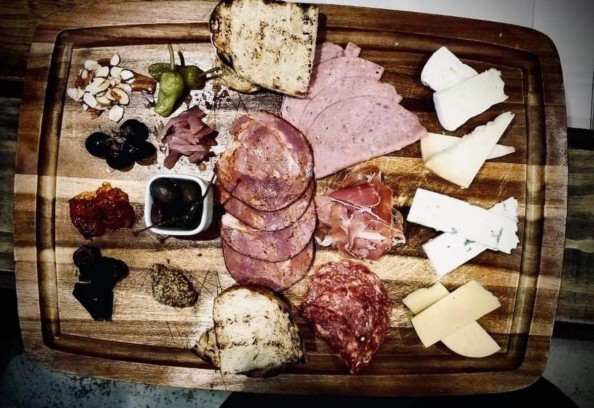 Salumi e Formaggi is the artisanal cheese and meats board at Fresco Italiano in Tifton. Featured is capicola ham, salami cotto, prosciutto di parma and soppressata piccanti. Parmesan cheese, Thomasville Tom, Brie and Blue cheese. “We finish the board with seasonal jam, olives, grapes and crostini crackers,” said Chasitie Roberts, the restaurant’s general manager. The restaurant’s owners are opening a Fresco Italiano in Warner Robins.