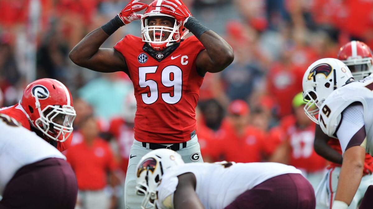 Georgia linebacker Jordan Jenkins (59) calls a play as the ULM offense gets ready to snap in the second half.