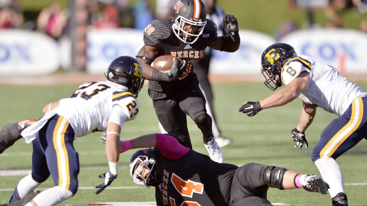Mercer running back Tee Mitchell (28) and the Bears are 3-3 entering their game Saturday against VMI.