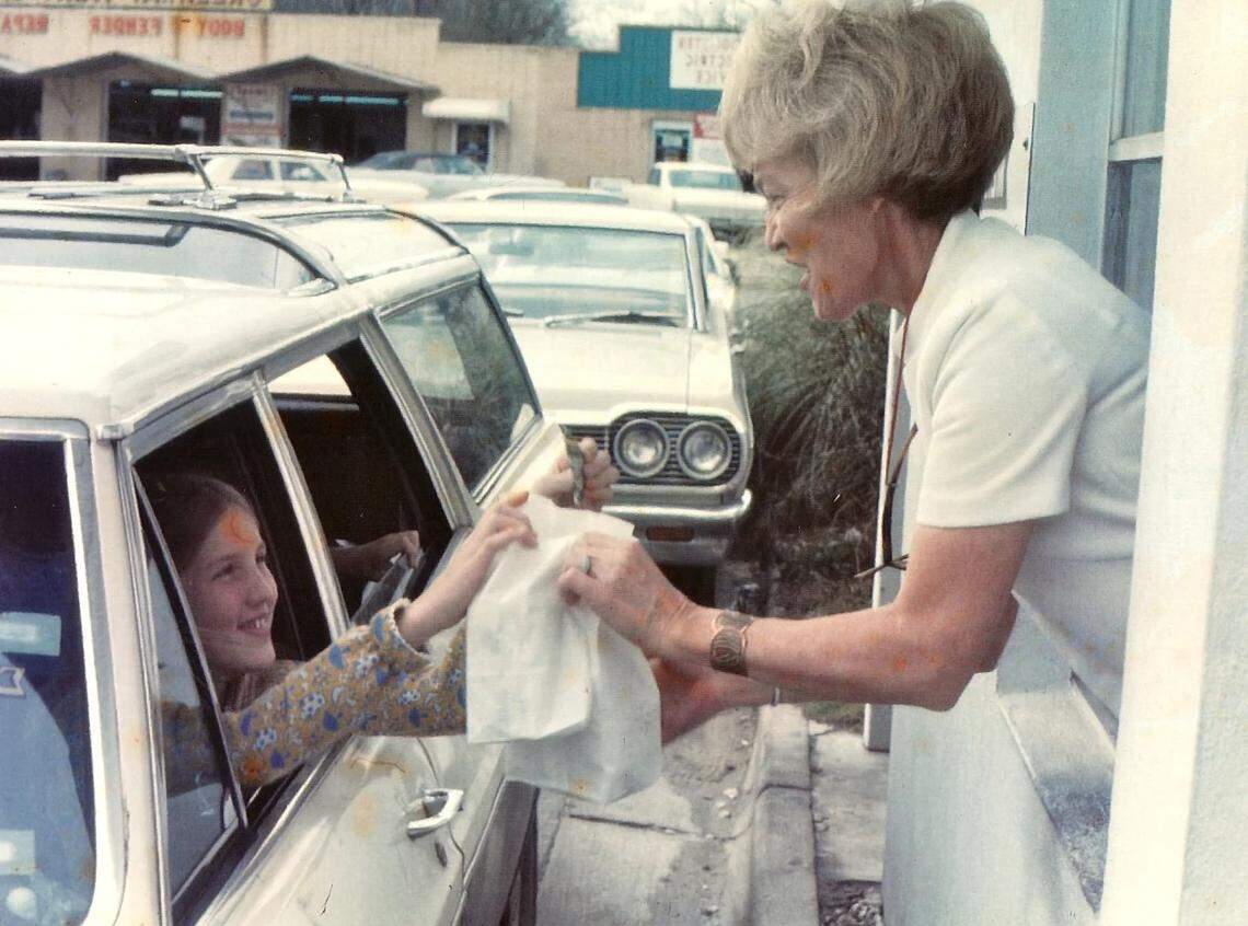 In an undated photo, customers go through the drive-thru of a Nu-Way Weiners.