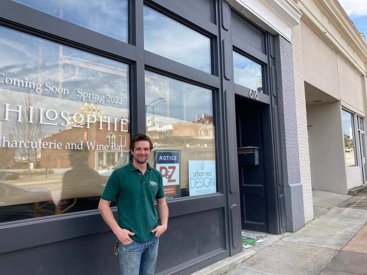 Kyle Tucker, general manager for Philosophie Charcuterie and Wine Bar at 616 Poplar St., outside this new spot in downtown Macon expected to open this spring.