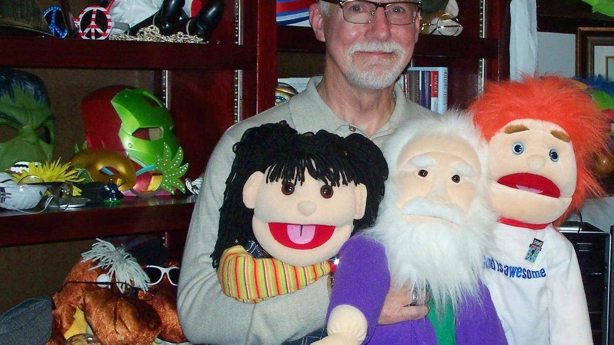 Pastor Don Moncrief of Northside Baptist Church with puppets he helped create and use during his years of children's ministry at the church and in the community.