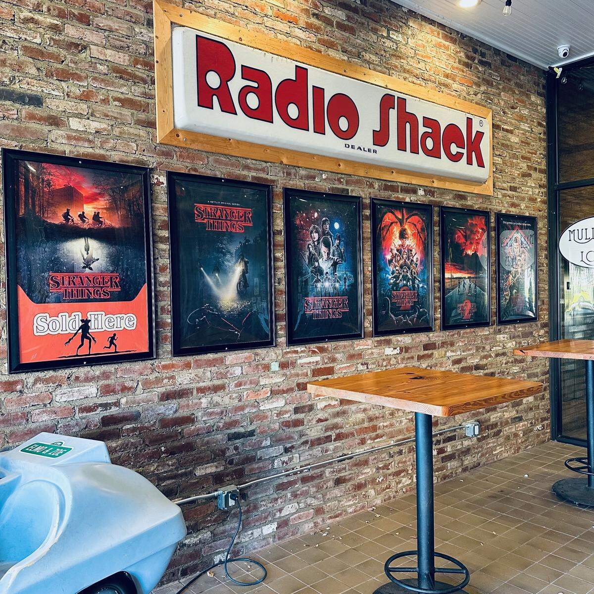 Radio Shack sign and poster wall for “Stranger Things” in Jackson, Georgia
