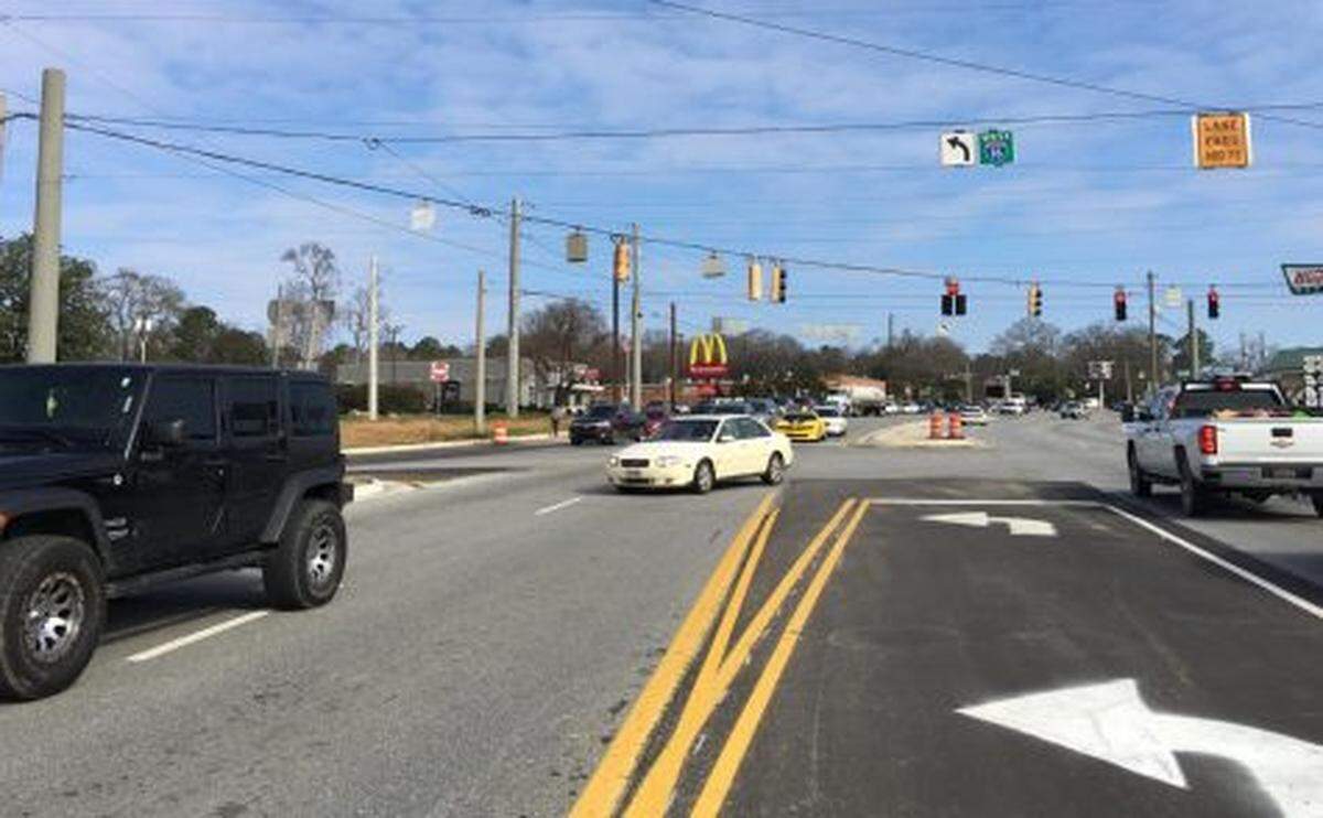 A new left turn lane onto Interstate 16 West at Spring Street means southbound traffic no longer can turn right on red to get onto the interstate.