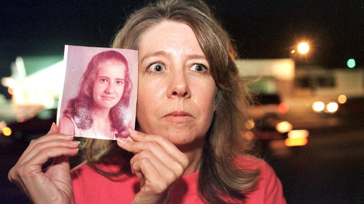 Joanette Barnes, Carlene’s younger sister, with the photo of Carlene in a picture taken in 1999 for a series of articles about Carlene’s 1972 vanishing.