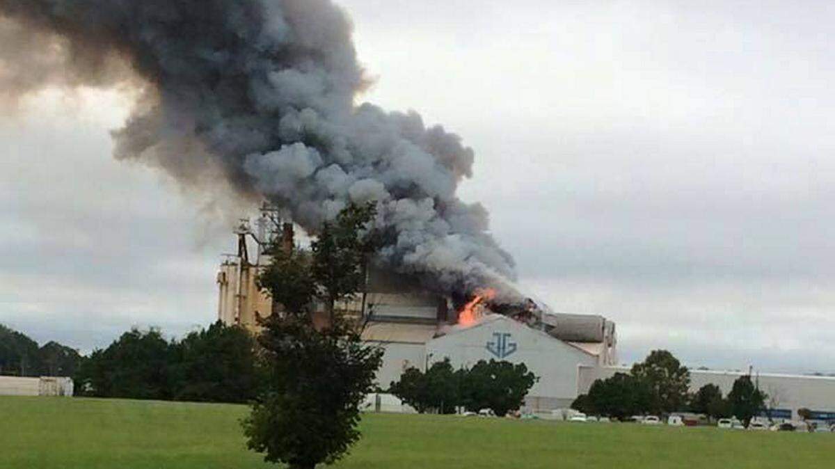 Firefighters battled a blaze at Anchor Glass in Warner Robins Friday.
