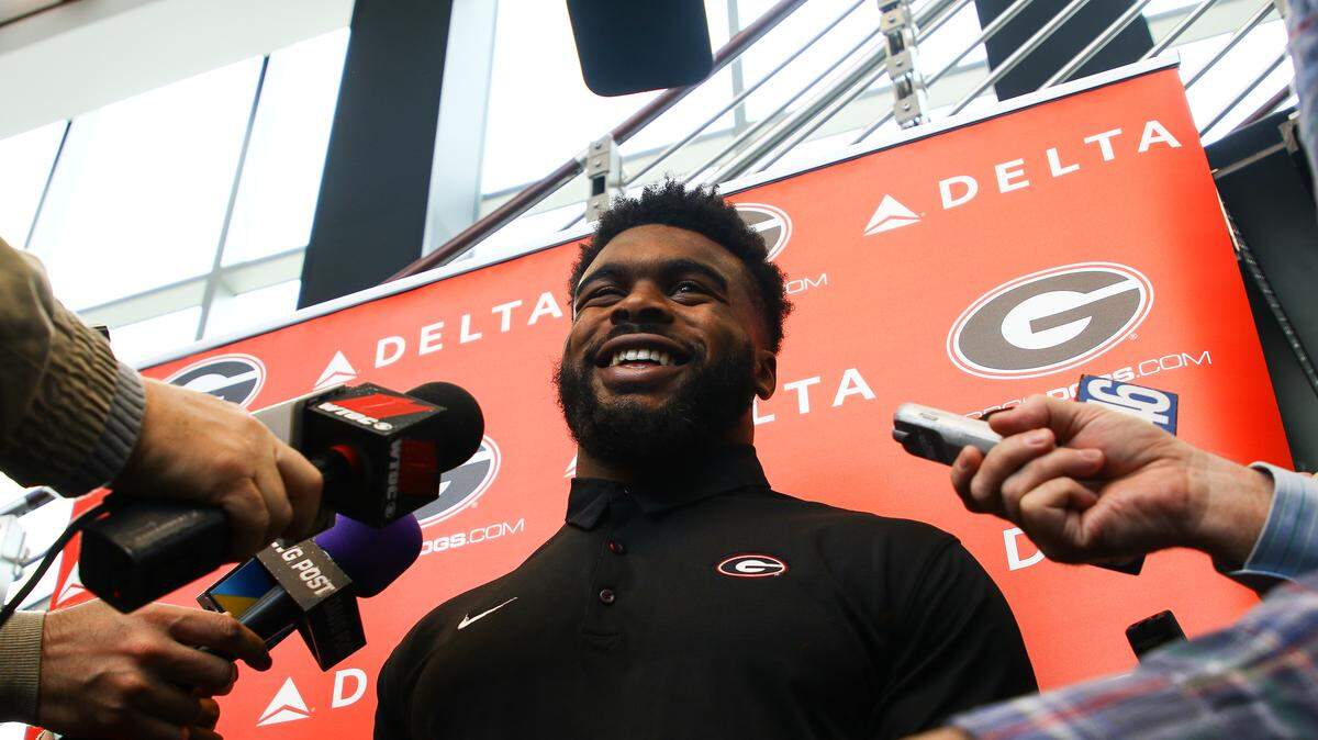 Georgia tailback Elijah Holyfield (13) speaks to members of the media at a press conference in Butts-Mehre Heritage Hall in Athens, Ga., on Monday, Nov. 26, 2018.