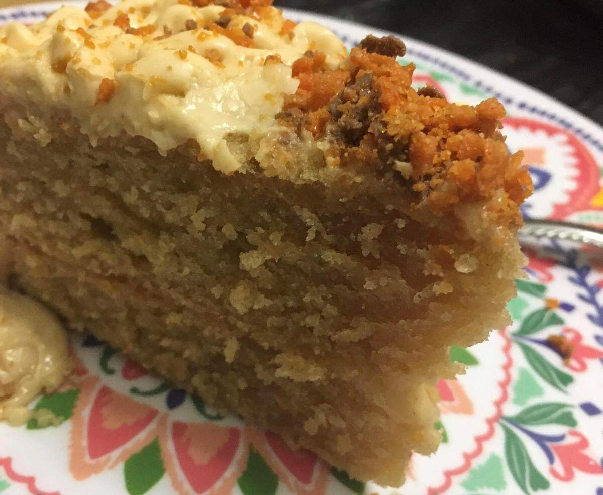 A slice of homemade peanut butter cake, among the many baked goodies offered up Dynamic Pastries by Champane inside the Macon Flea Market at 3670 Eisenhower Parkway.