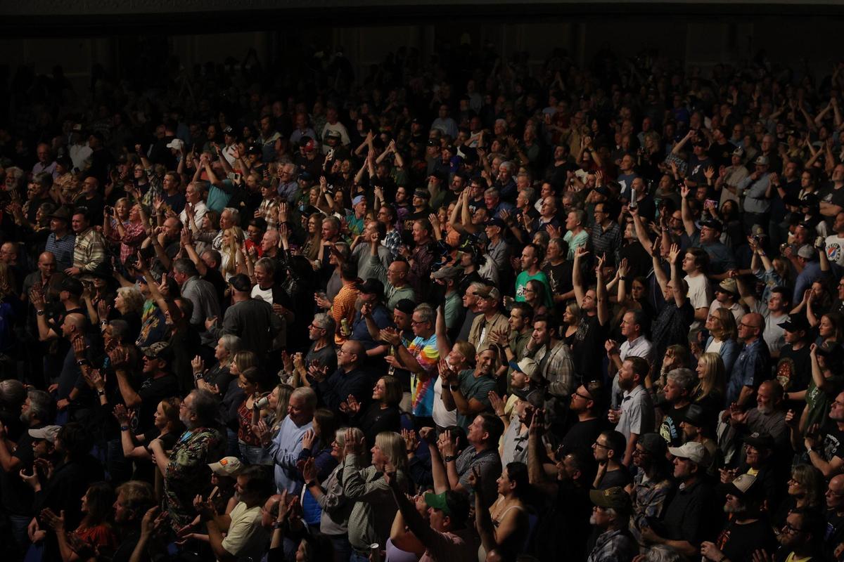 Attendees cheer at the “In Memory of Dickey Betts” concert on Friday, Feb. 28, 2025, at the Macon City Auditorium in Macon, Georgia. Musicians from across the country gathered in Macon for a one night only, sold out concert honoring one of the original members of The Allman Brothers, guitarist Dickey Betts, who died in April 2024. All proceeds from the show went towards a scholarship in his name at the Berkelee College of Music in Boston.