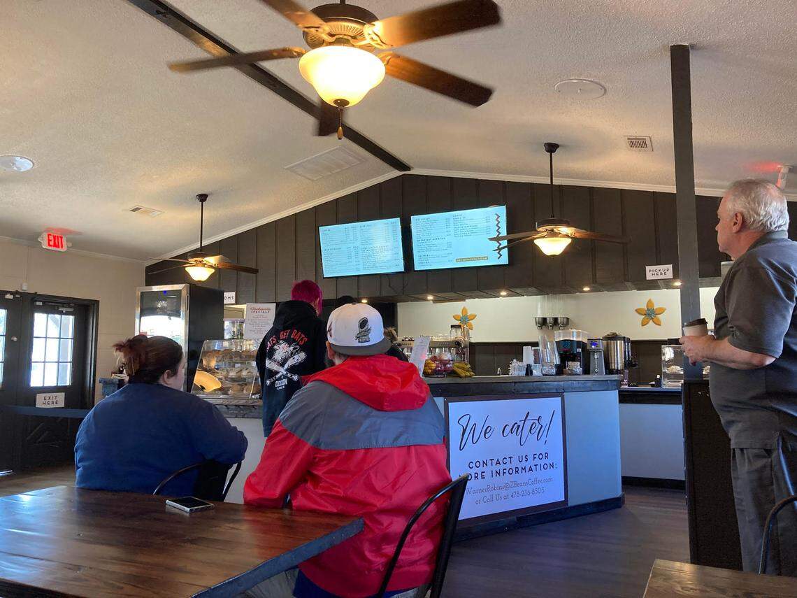 Customers wait for their orders at the new Z Beans Coffee at 102 South Armed Forces Blvd. in Warner Robins.