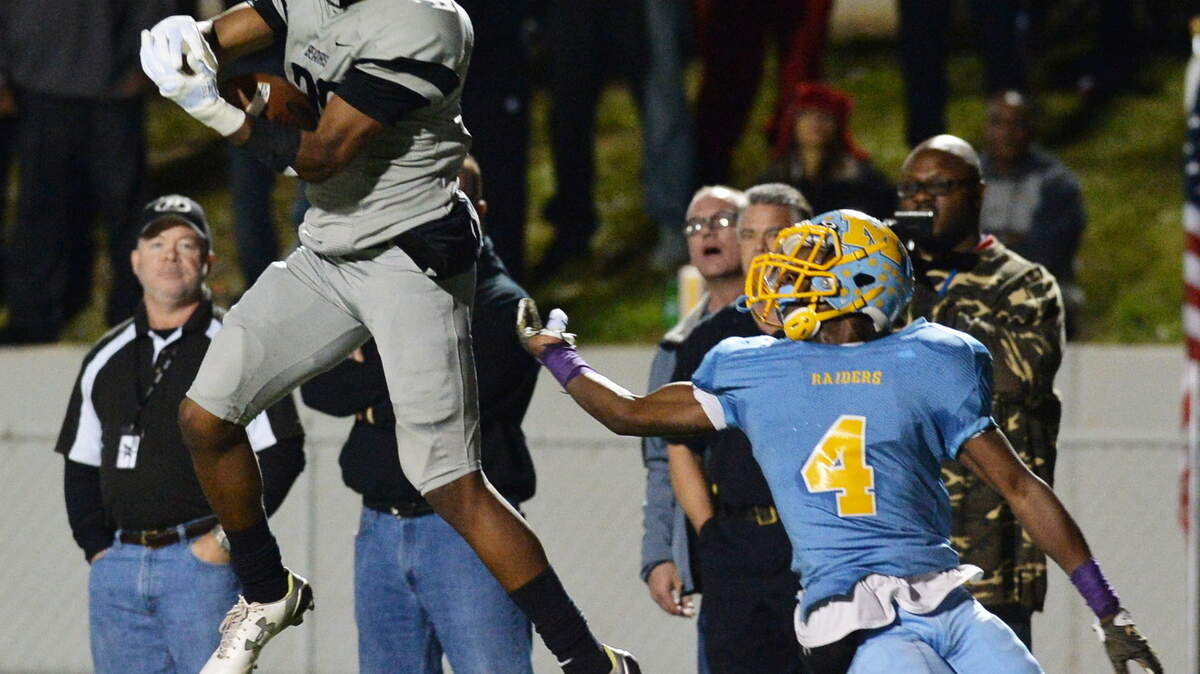 Houston County's Amari Colbert (26) goes high to make a catch on a Jake Fromm pass in the first half against Mays.