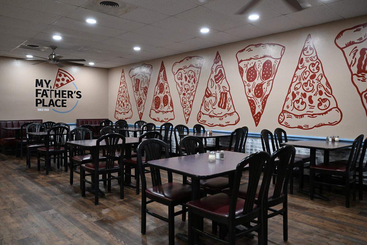 The dining room of My Father’s Place includes new painted artwork on the walls shown here on Tuesday, Aug. 19, 2025, in Warner Robins, Georgia. Jacob Kline’s wife, Hope Kline, and her mom, Tracy “Gigi” Wheeler, did all of the artwork in the restaurant.