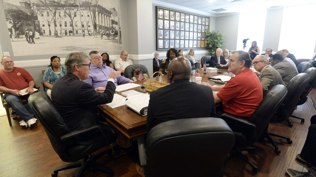 Accountant Miller Edwards, left, tells the mayor and Bibb Commissioners this week that a forensic audit might not be as valuable to them as just simply monitoring revenues and expenditures on a monthly basis -- especially if there is no criminal activity suspected.