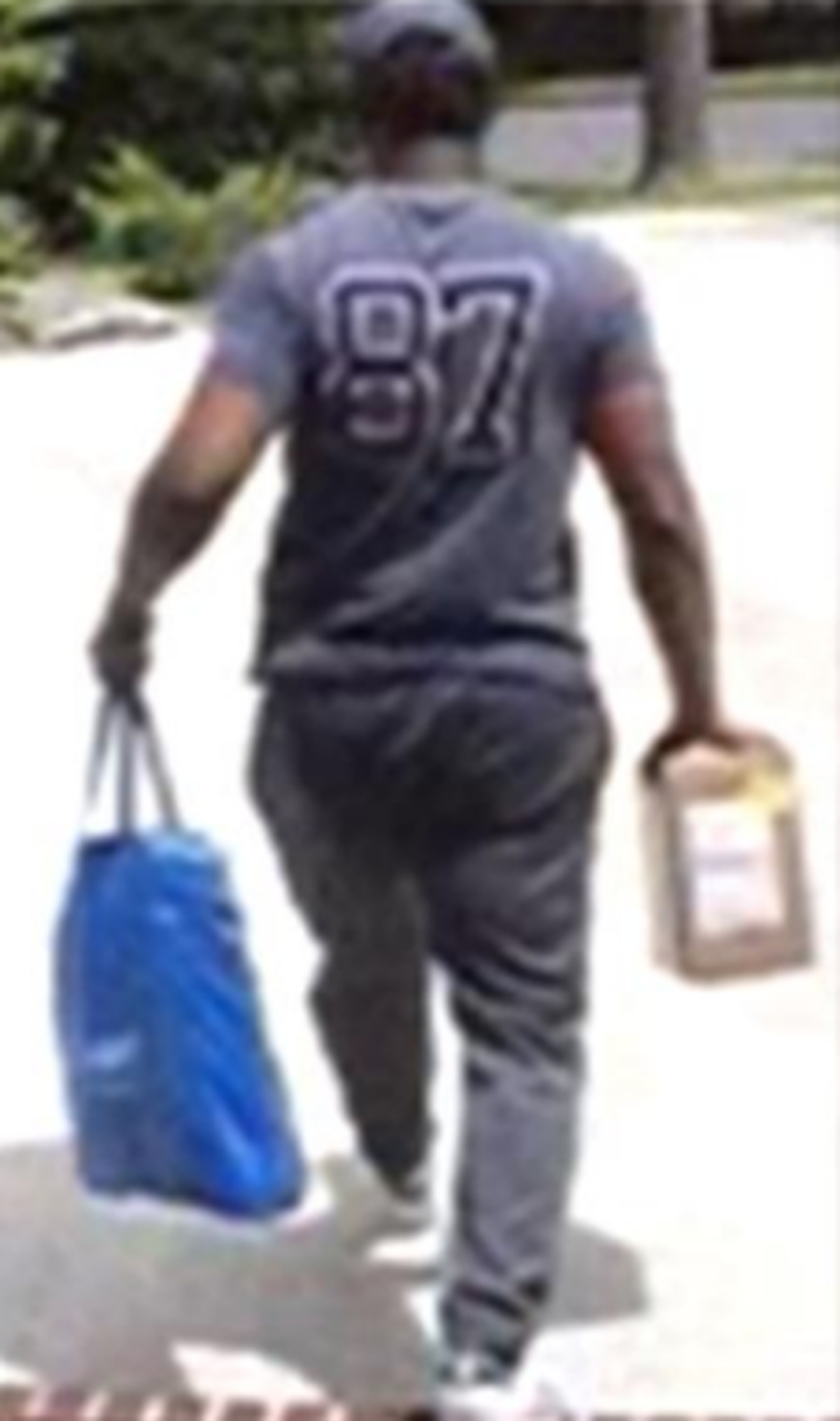 The suspect in a porch theft was spotted wearing a jersey with the number 87 on the back.