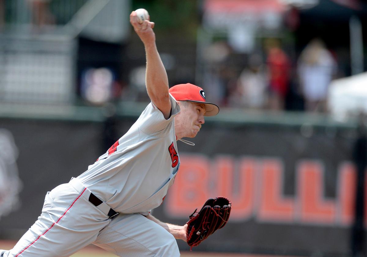 Georgia pitcher Tim Elliot (44) delivers a pitch to the plate during the Bulldogs’ NCAA regional game against Florida Atlantic Sunday in Athens.