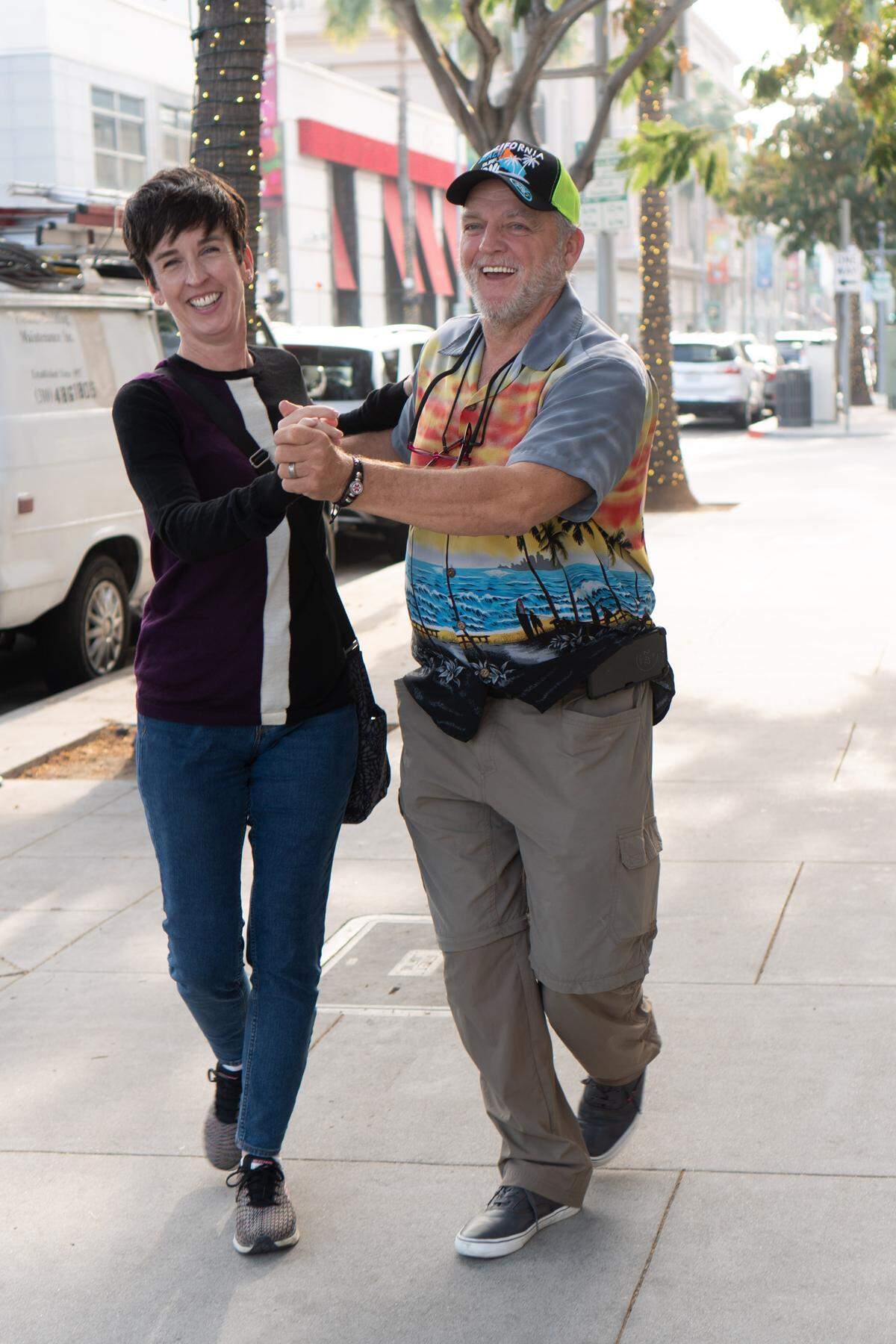 Laura Thomason and her husband, Daniel Boudreault, dance down a street. They were in Lose Angeles for the taping of the game show, “Jeopardy!” The show featuring Thomason as a contestant airs at 7:30 p.m. Wednesday on WMAZ-TV.