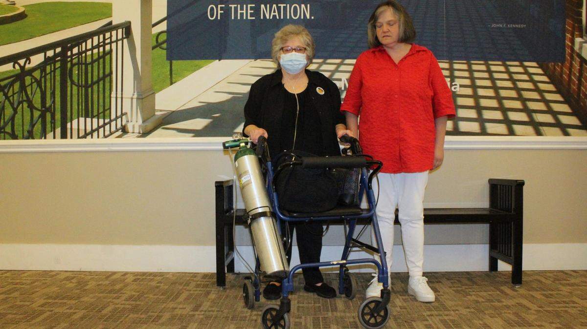 Macon-Bibb County voters Patricia (left) and her daughter Michelle Kitchens faced mobility challenges when they voted early at Macon Mall.