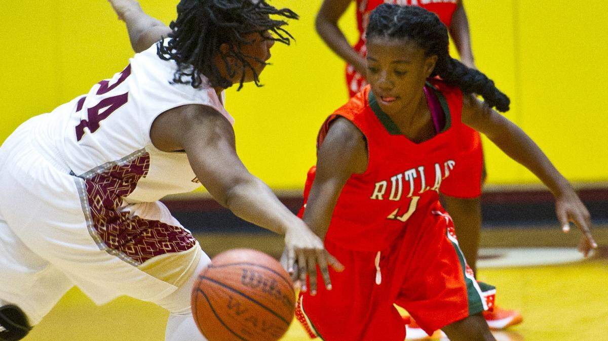 Rutland's Breanca Davis (10), right, steals the ball from Westside's Jamesia Holliman (24) during the first half of their game Tuesday