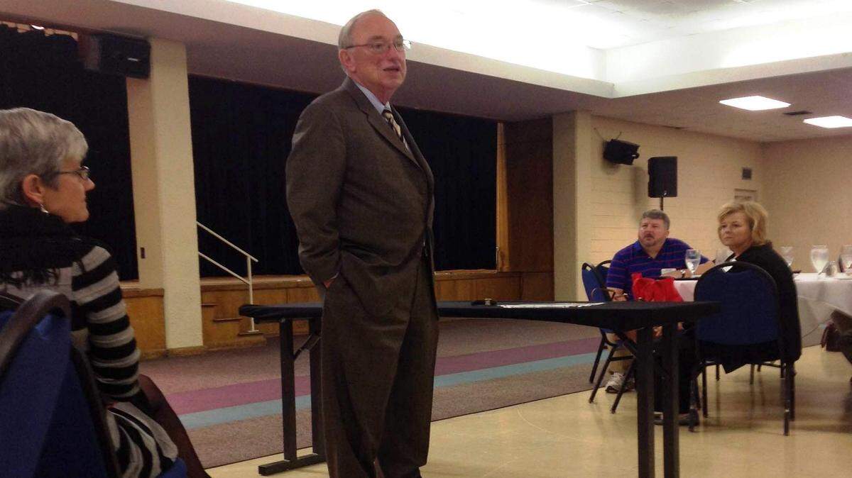 Hank Huckaby, chancellor of the University System of Georgia, addresses the Macon Downtown Rotary Club Dec. 3, 2014.