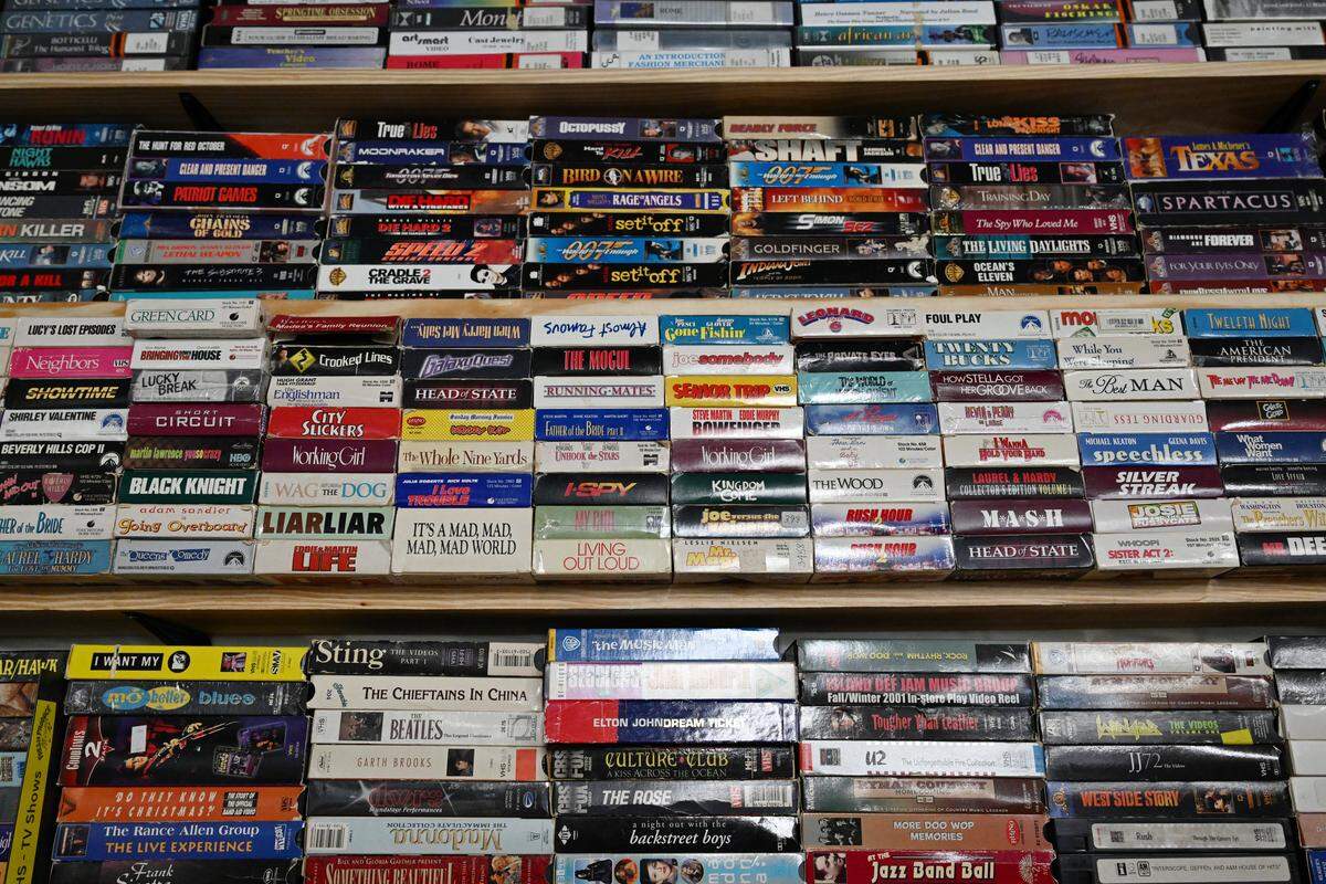 VHS tapes sit in the back of the expanded storefront of Fresh Produce Records on Tuesday, Sept. 2, 2025, in downtown Macon, Georgia. The majority of the media in the new storefront was in storage without sufficient space in the original shop. 
