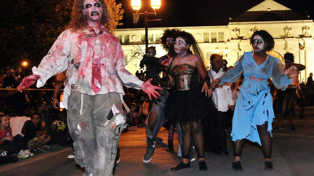 WOODY MARSHALL/THE TELEGRAPHZombies walk into Cherry Street Plaza at a previous year's Zombie Parade in Macon.