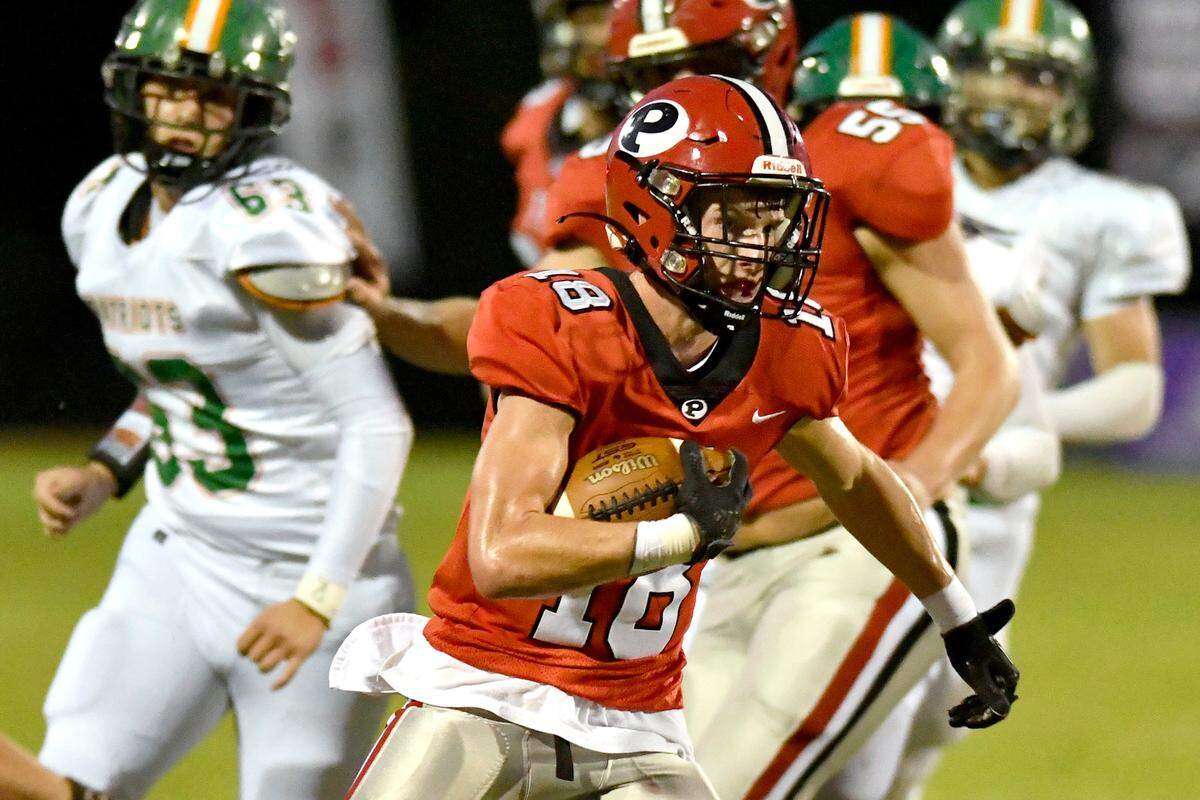 FPD’s Breck Griffin (14) gains a first down on a second quarter reception during the Vikings’ game against Pinewood Christian Friday.