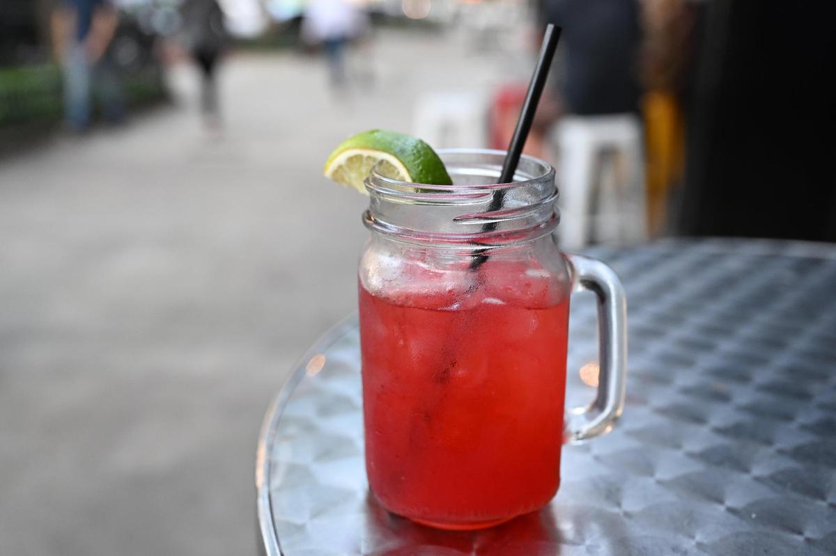 A Mulejora’s Mask sits on a table outside of Reboot Retrocade Bar on Monday, June 2, 2025, in Macon, Georgia. The cocktail consists of gin, blackberry mint syrup, lime and ginger beer.