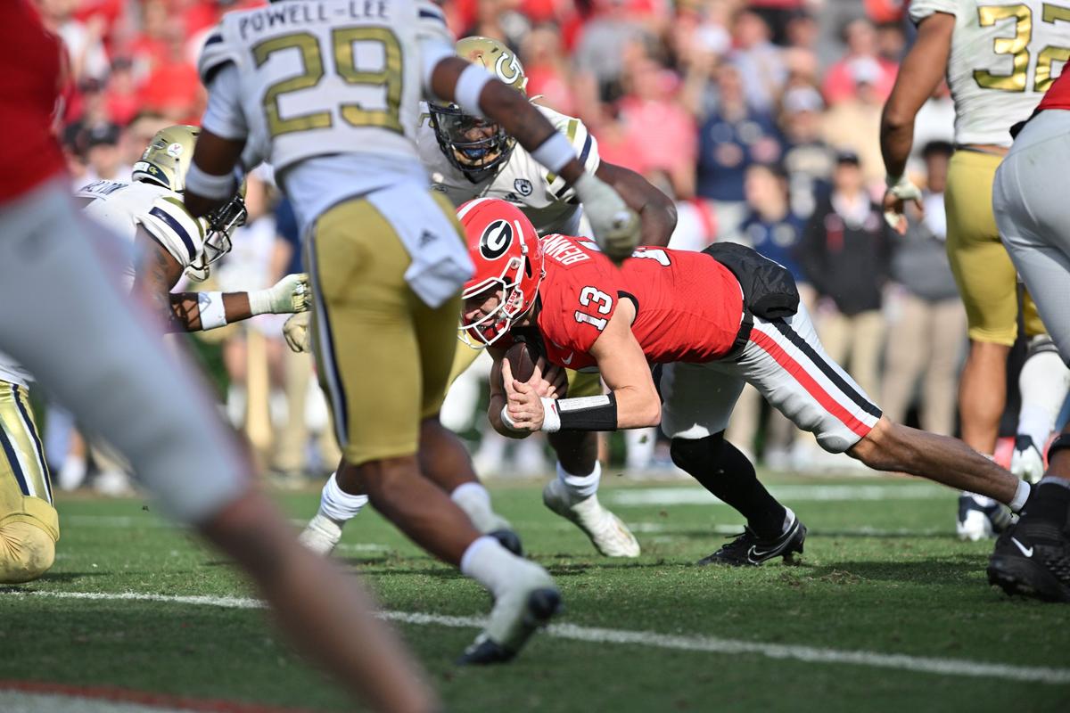 Georgia quarterback Stetson Bennett dives for the endzone in the first quarter against Georgia Tech. The play was reviewed and ruled it was not a touchdown.