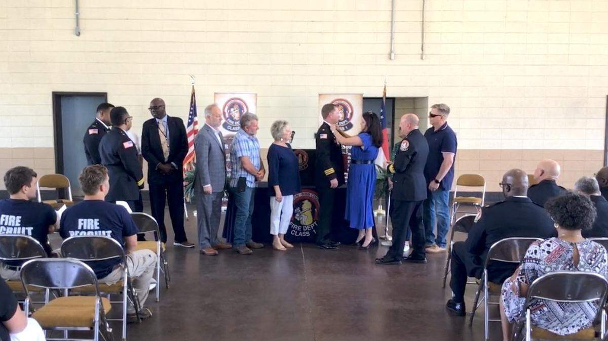 Ronald Smith, Jr. was appointed Macon-Bibb County Fire Department Deputy Chief on Wednesday and pinned by his wife at the ceremony.