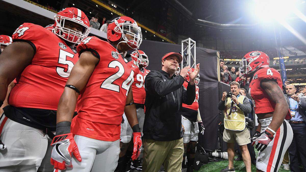 In this Jan. 8, 2018, file photo, Georgia head coach Kirby Smart and his players prepare to take the field before the College Football Playoff National Championship game against Alabama in Atlanta. Saturday’s SEC Championship, is the game the Bulldogs have wanted since last January, when the Alabama pulled out a 26-23 overtime victory in the national championship game.
