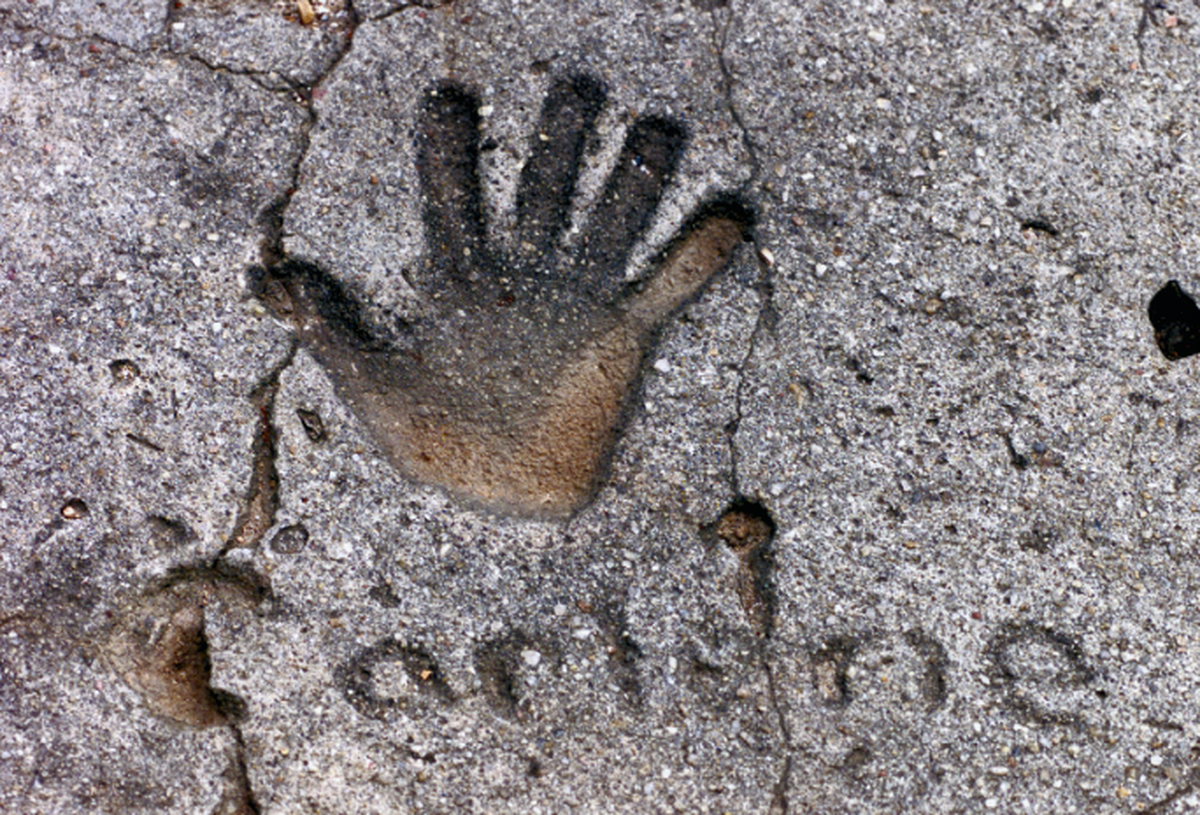 Carlene’s childhood hand print, pictured here in 1999, at the end of the driveway at the Tengelsen’s former home on Easy Street in west Macon. The print was still visible for years after the family moved away in the wake of Carlene’s 1972 disappearance.
