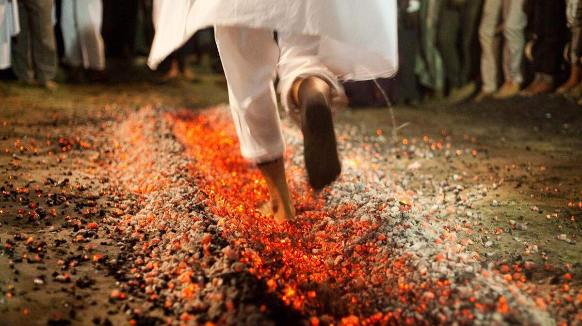 Macon photographer Christopher Smith’s shot of a coal walker taken while he lived and worked in Southeast Asia in the mid-2010s is one of many works at Macon200’s new Bicentennial Art Show exhibit opening tonight at the Macon Mall.