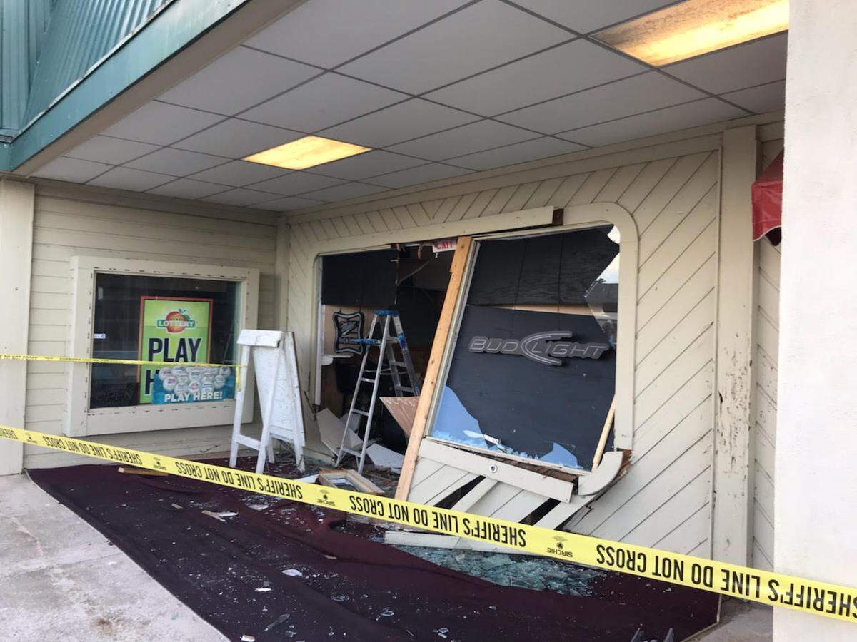 Sheriff’s tape surrounds 20s Pub and Subs in Macon on Sunday after a man rammed his truck into building, according to the Bibb County Sheriff’s Office.
