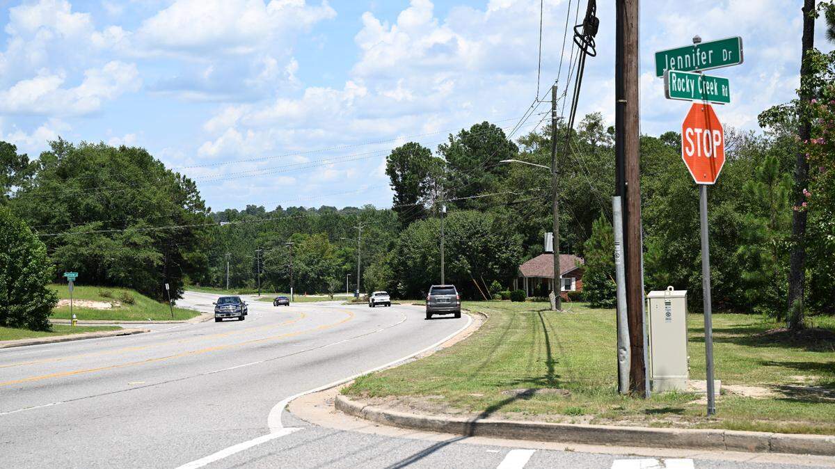 Vehicles drive east and west on Rocky Creek Road near Jennifer Drive on Tuesday, July 15, 2025, in Macon, Ga. An SUV and an 18-wheel truck crashed here on Thursday, July 10, 2025, which left Donnie Paul Rowell, the SUV driver, dead.