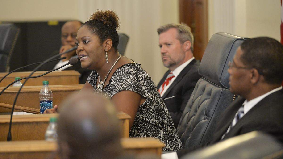 State Rep. Nikki Randall responds a question during a 2014 forum of community leaders discussing gun violence at the Macon-Bibb Government Center.