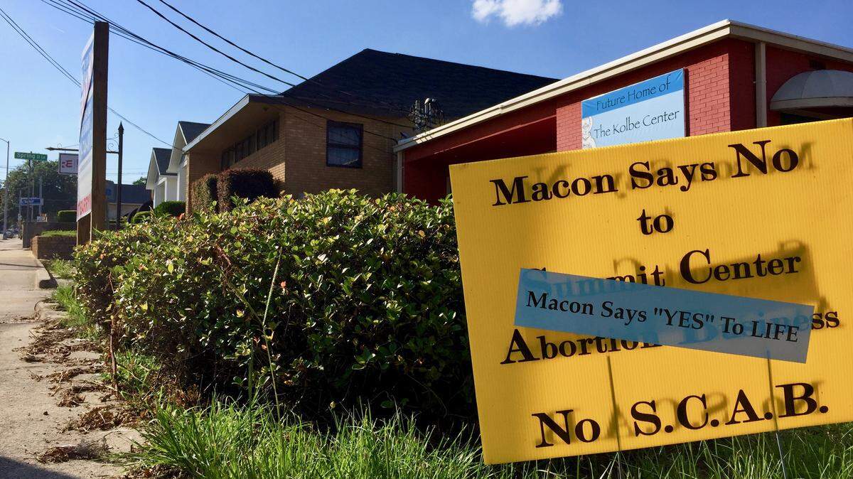 A sign on Walnut Street outside the future location of the Kolbe Center, now located on Forsyth Street, sends a message to passersby that abortion clinics are not welcome in Macon. The building was still under renovation on May 23, 2019.