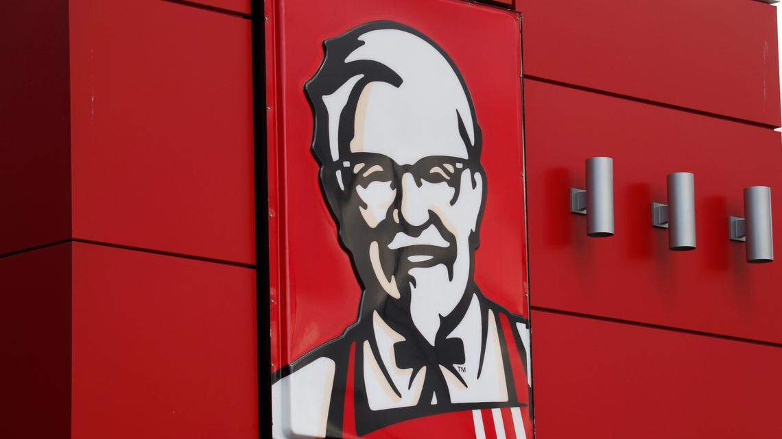 The worker was standing outside the restaurant when he was shot, police say.