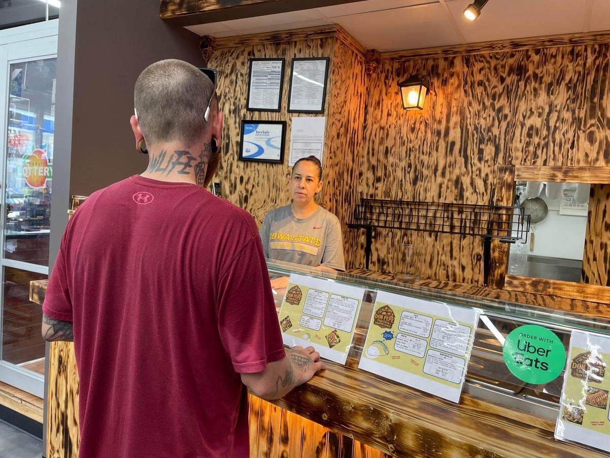 Regular customer Chris Roberson places an order at Don Pepe Taqueria & Country Diner in Warner Robins.