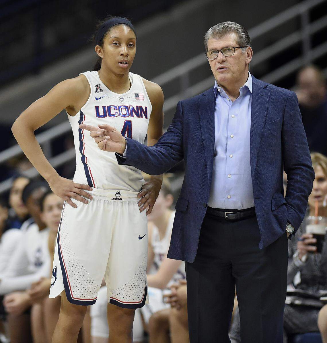 Connecticut coach Geno Auriemma, right, talks with Mikayla Coombs during the first half the team’s NCAA college basketball game against Tulsa, Thursday, Jan. 18, 2018, in Storrs, Conn. (AP Photo/Jessica Hill)
