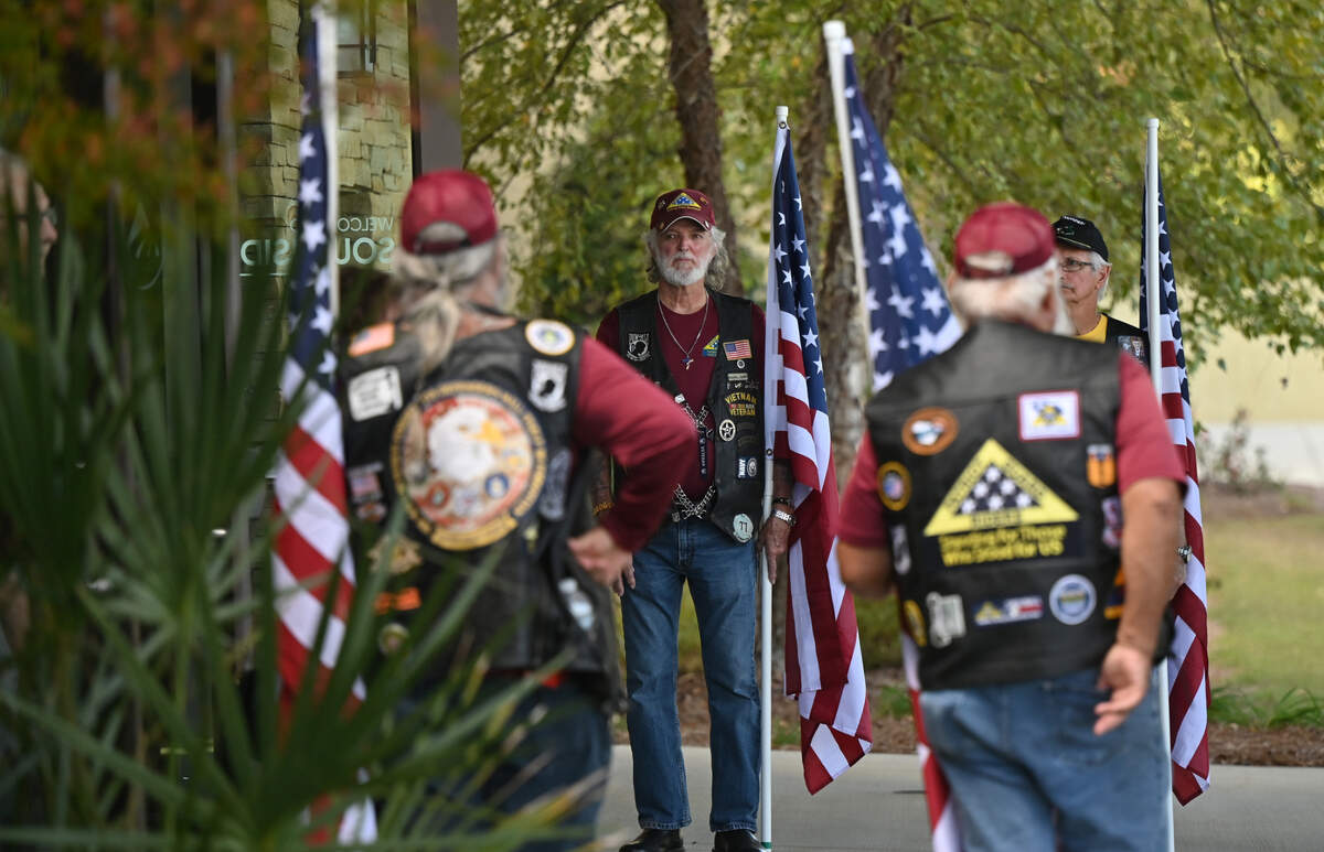 Members of the Sixth District American Legion from Warner Robins stand outside of Southside Baptist Church for the visitation of the late Houston County Sheriff Cullen Talton on Tuesday, Oct. 22, 2024 in Warner Robins, Georgia.