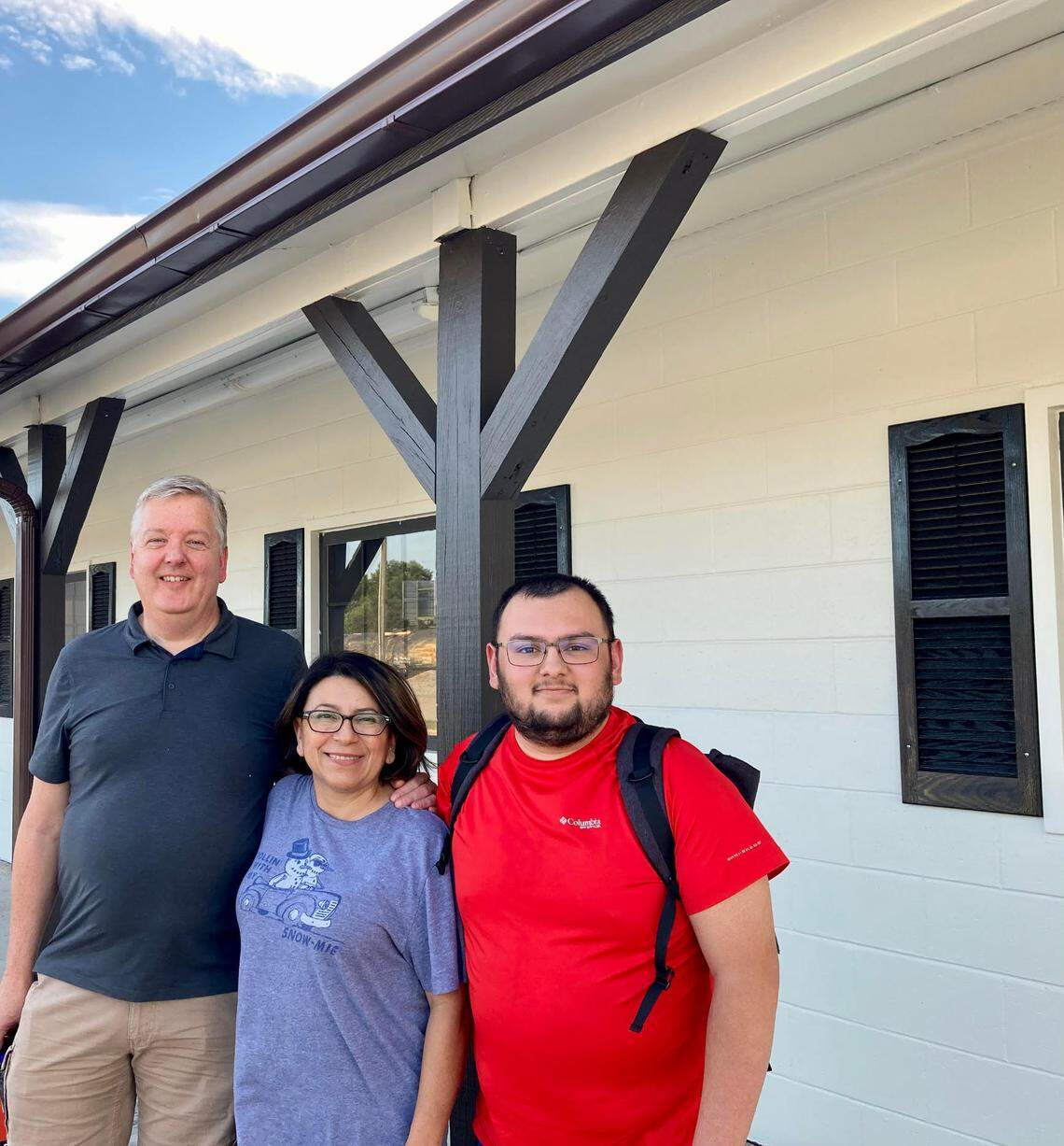 From left to right, franchisees Gus and Sally Lempsink and their son, Andrew Wilson, in front of their new Z Beans Coffee shop in Warner Robins across from Robins Air Force Base and adjacent to the Warner Robins Law Enforcement Center.
