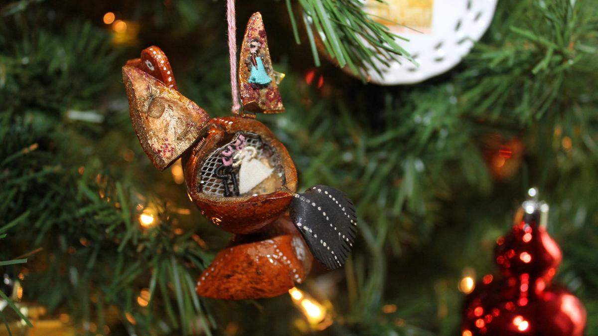 Fred and Mary Zampa own this unique duck ornament with a bride and groom inside.